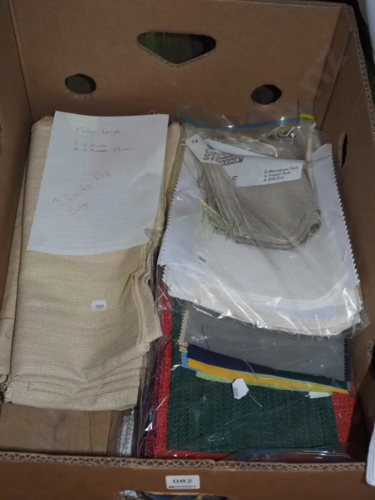 box of fabric pieces Image 1++