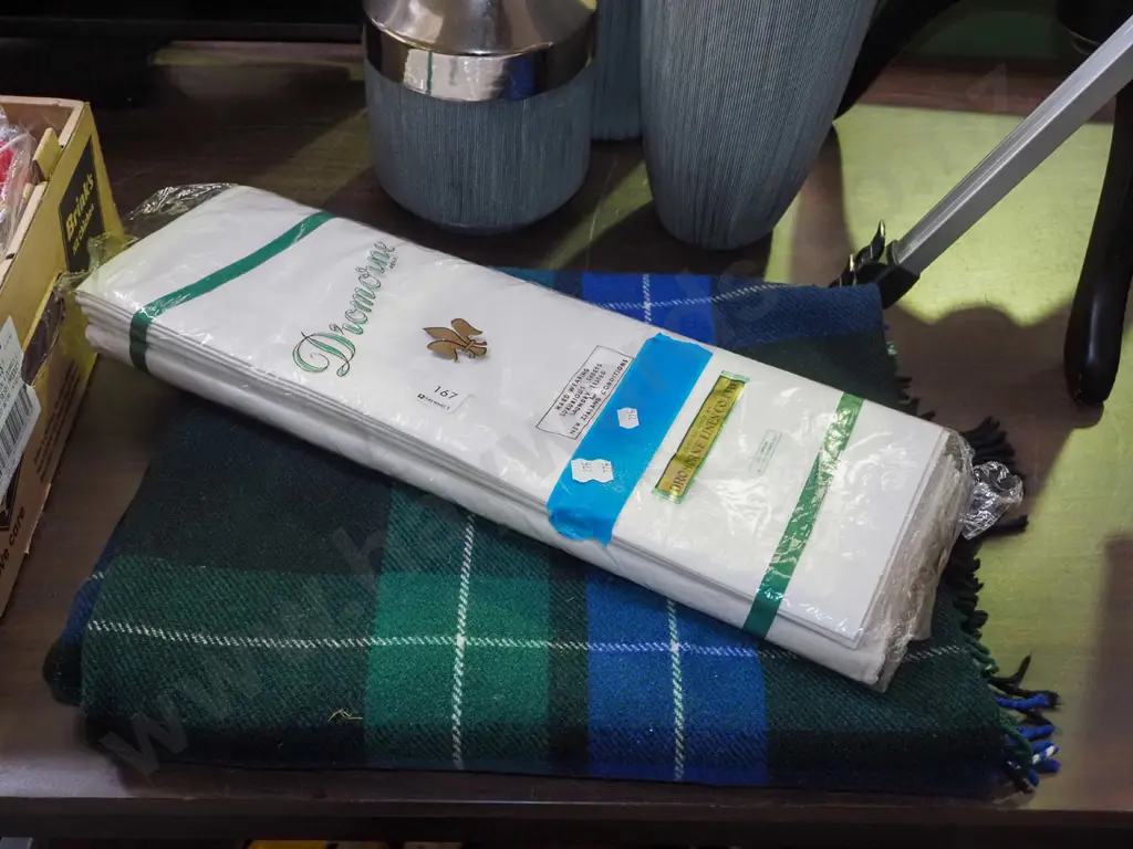 as new Irish linen sheets, checked woollen travel rug Image 1++