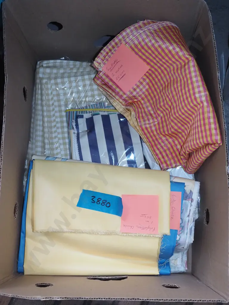 box of fabric pieces Image 1++