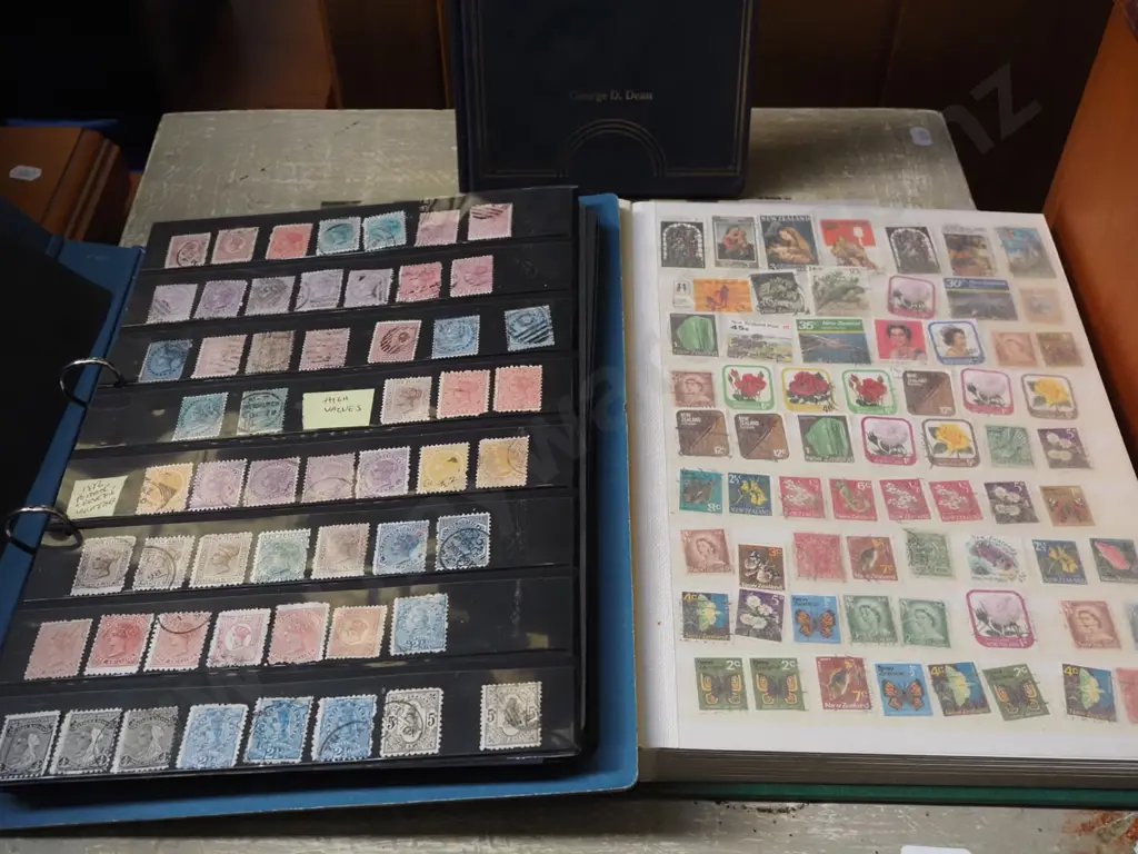 2x stamp albums, book on tokens and medals Image 1++