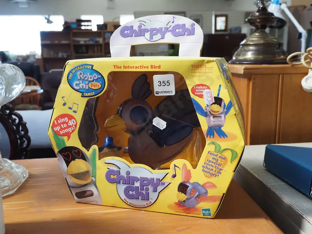 boxed as new Chirpy-Chi electronic bird Image 1++