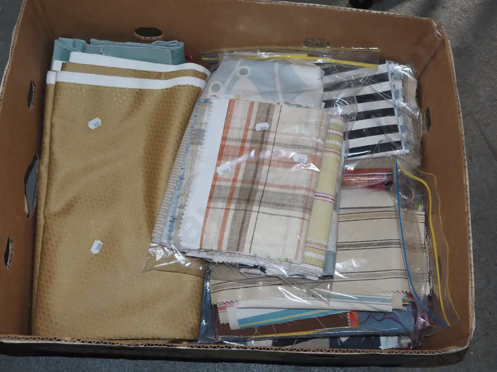 box of fabric pieces Image 1++