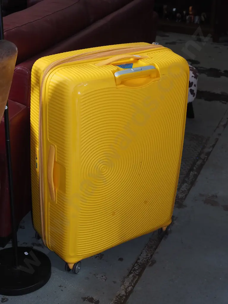 large yellow American Tourister suitcase Image 1++