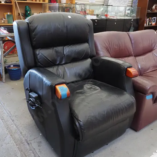 black leather and wood electric reclining armchair