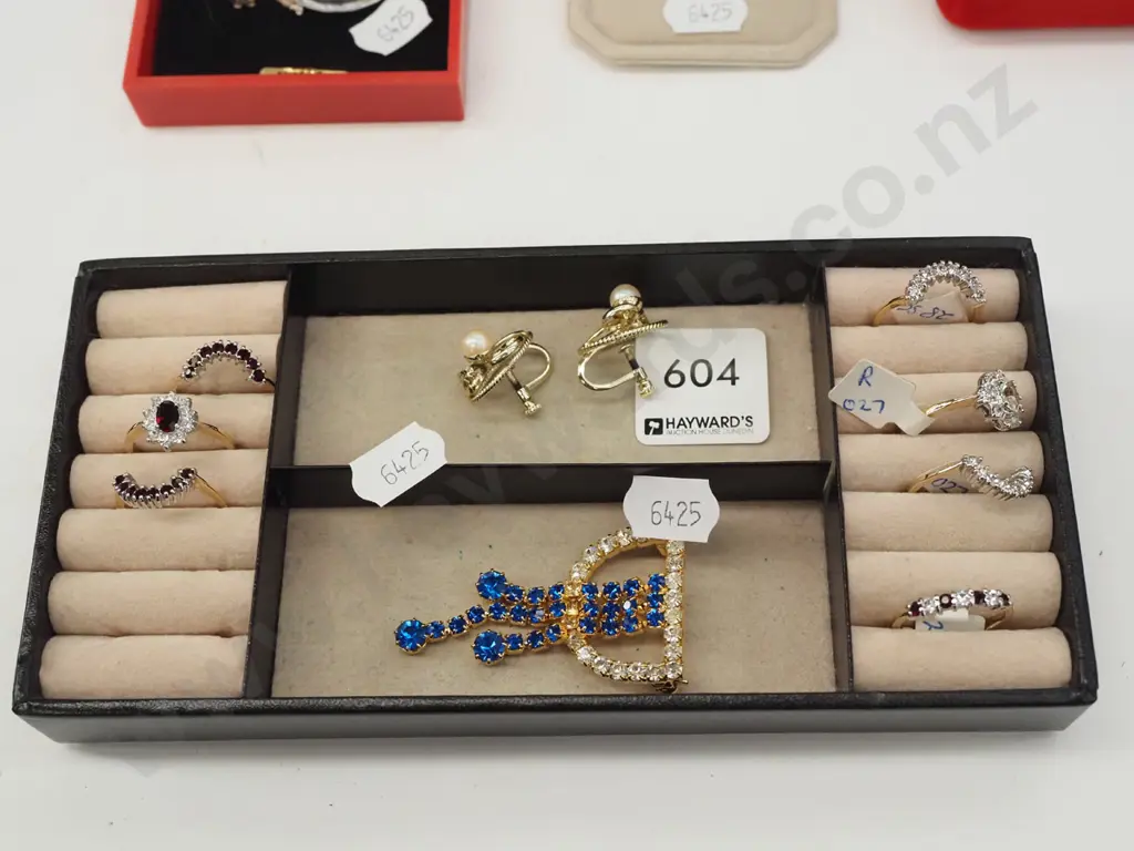 tray  and contents - gold plated rings, clip on earrings, brooch Image 1++