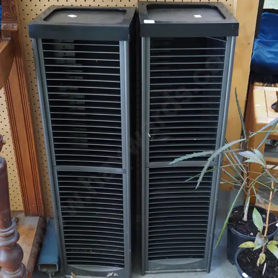 2x plastic DVD towers H875