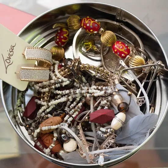 tin of costume jewellery