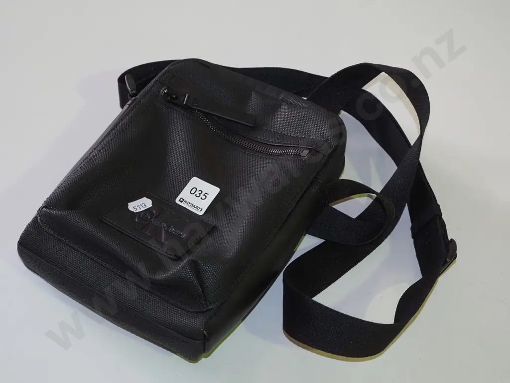 small leather on canvas bag Image 1++