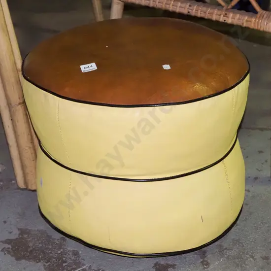 brown and yellow vinyl poof