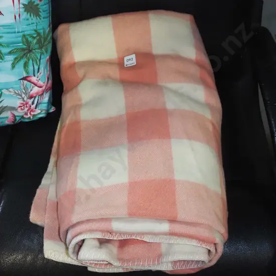 pink checked woollen blanket - some marks