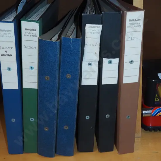 7 binders of stamps