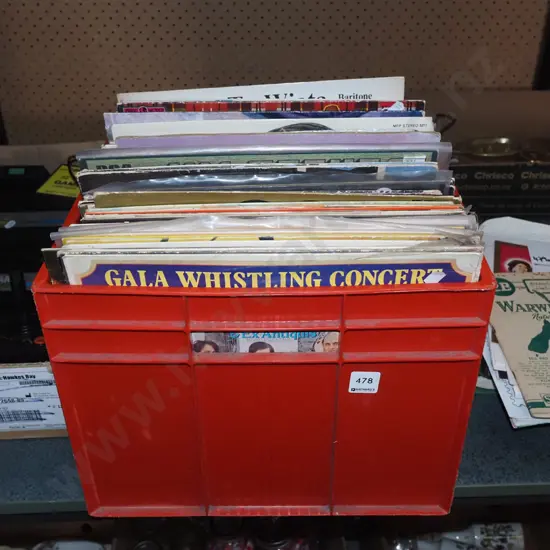 plastic tub of LPs