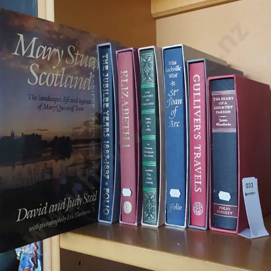 various slip cased and other books