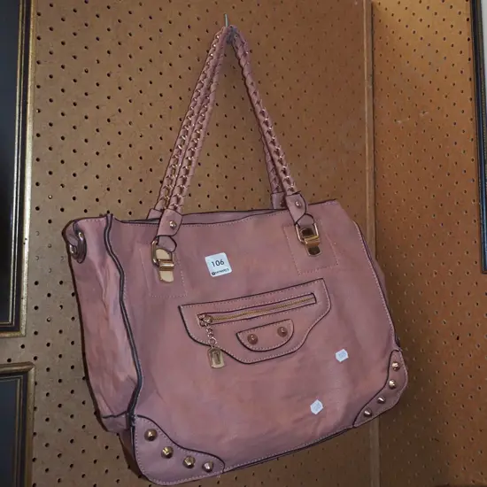 pink vinyl hand bag