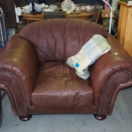 large leather rolled arm armchair