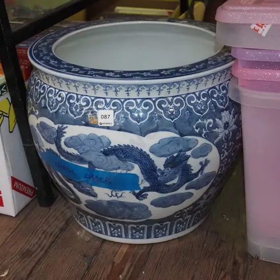 large blue and white dragon pot - has significant crack