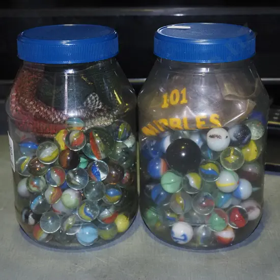 2x plastic containers of marbles