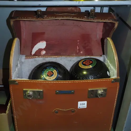 bag of Henselite Mosgiel RSA branded bowling balls