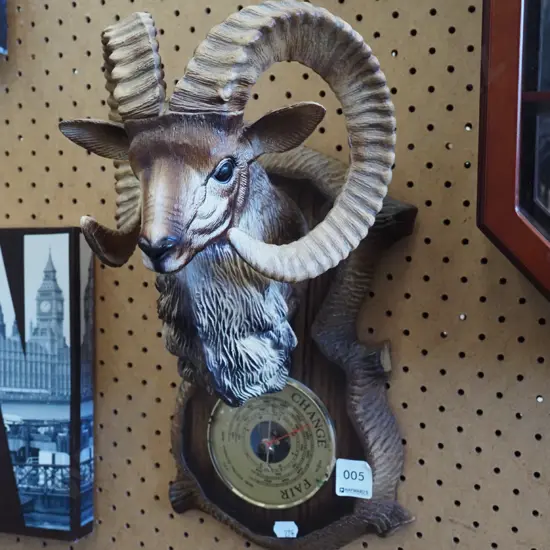 plastic goat themed barometer