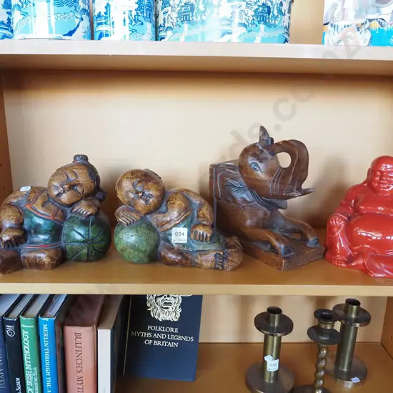 carved wooden figurines, bookends etc
