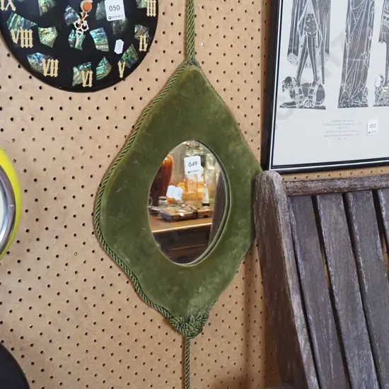 green velvet framed wall mirror