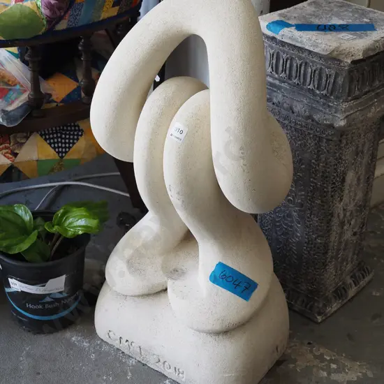 carved Oamaru stone garden ornament H690