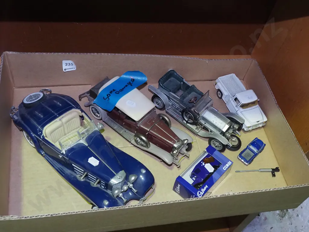box of toy vehicles - some damage Image 1++