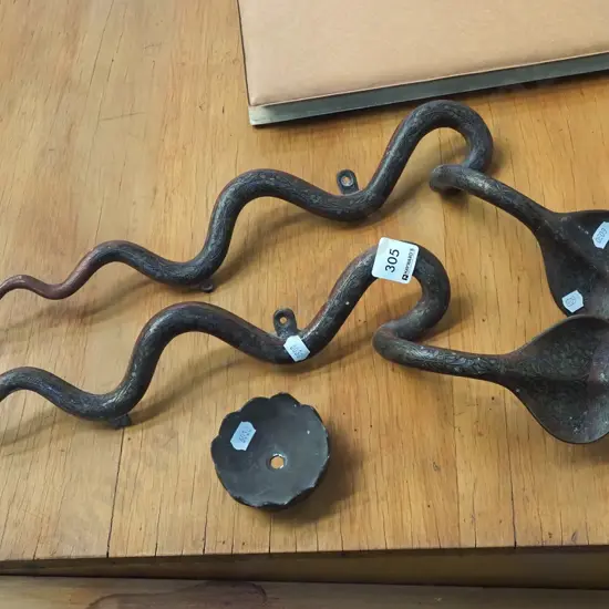 2x brass cobra wall mounted candlesticks - 1 top needs attention