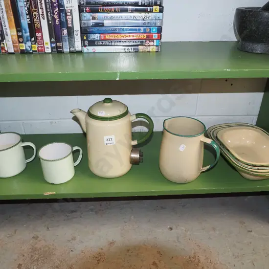 shelf of enamel ware; jugs, cups, kettle etc