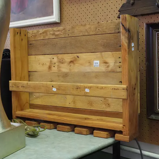 homemade pine wall mounted wine rack with glass holders