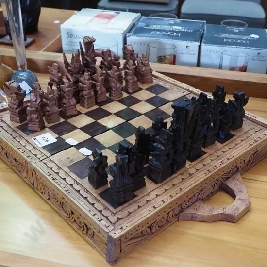 carved Indonesian chess board