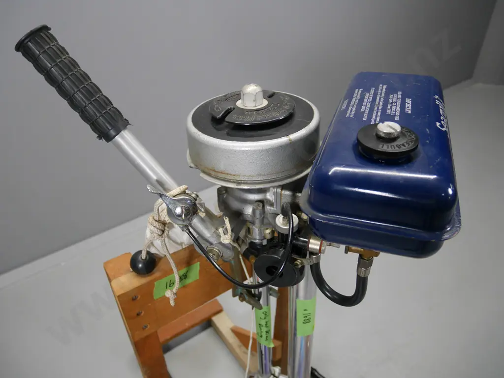 vintage Seagull 40 Plus outboard motor on timber stand with manuals, accessories, tank etc. Image 1++