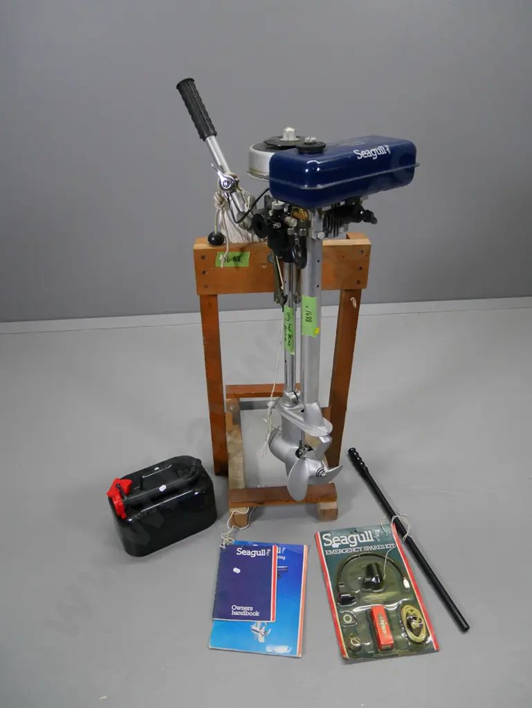 vintage Seagull 40 Plus outboard motor on timber stand with manuals, accessories, tank etc. Image 1++