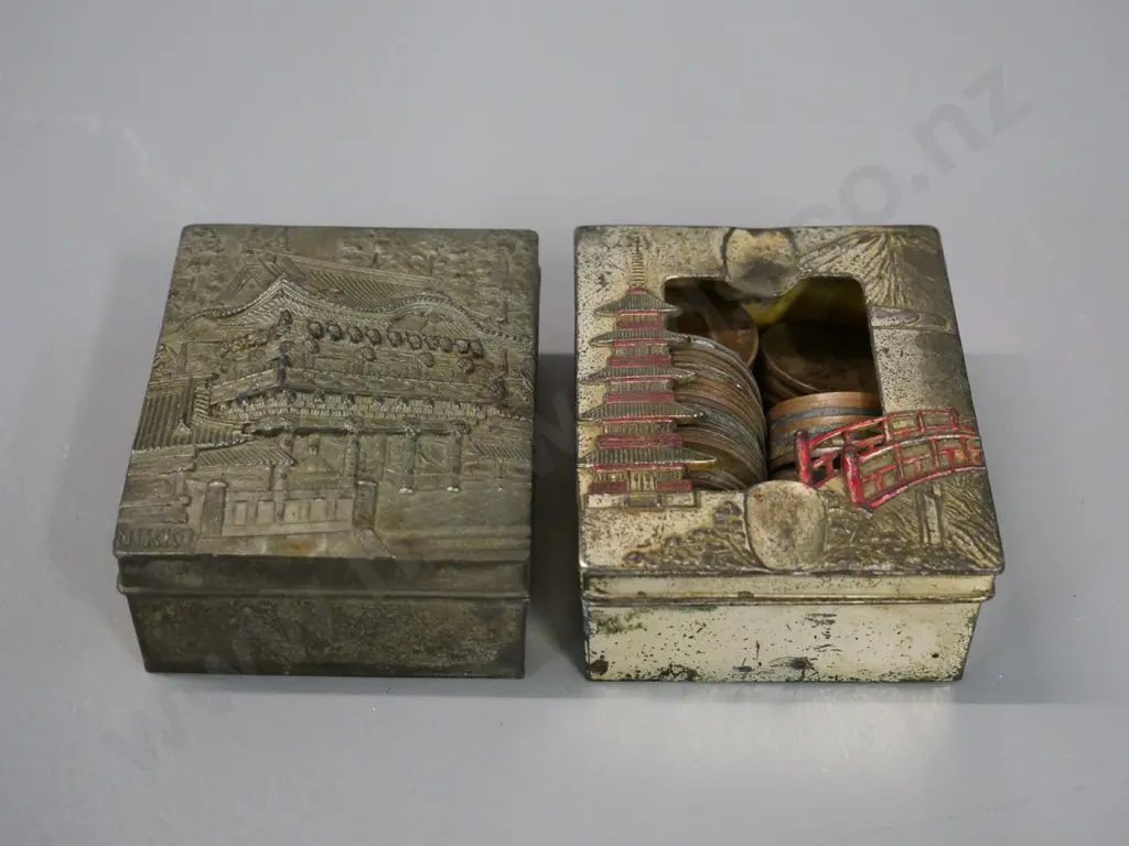oriental cast metal cigarette case and ashtray with removable pierced lid, full of vintage NZ and other coins Image 1++