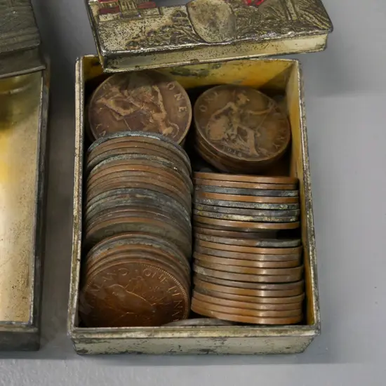 oriental cast metal cigarette case and ashtray with removable pierced lid, full of vintage NZ and other coins