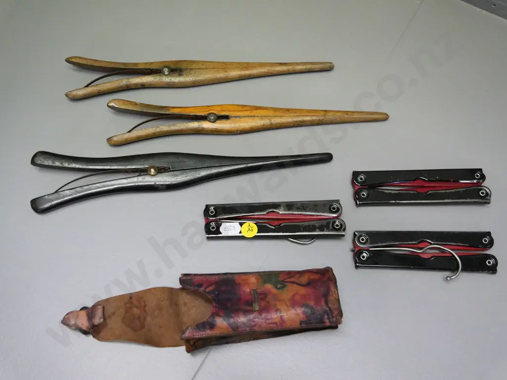 3 vintage wooden glove stretchers and a set of 3 folding travel coat hangers in soft leather case Image 1++