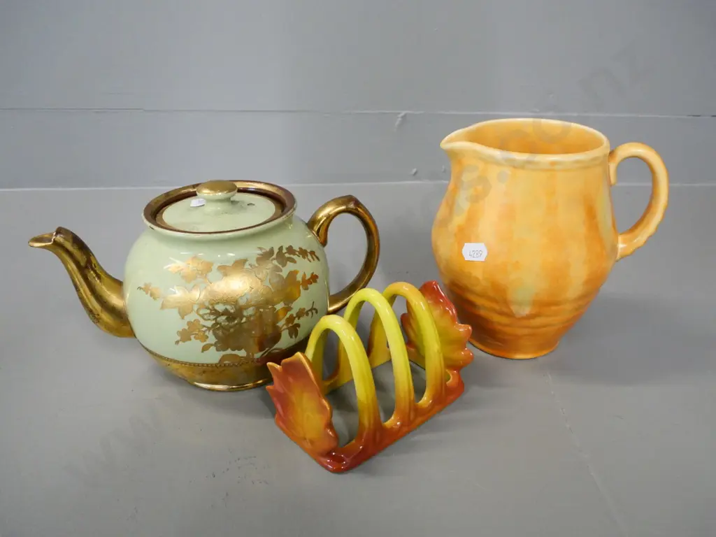 Beswick jug, Carlton ware toast rack, and a gold and green teapot Image 1++