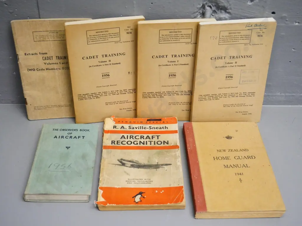 7 1940s and 50s publications on aircraft recognition, cadet training, NZ Home Guard Manual - 2 are in poor condition Image 1++