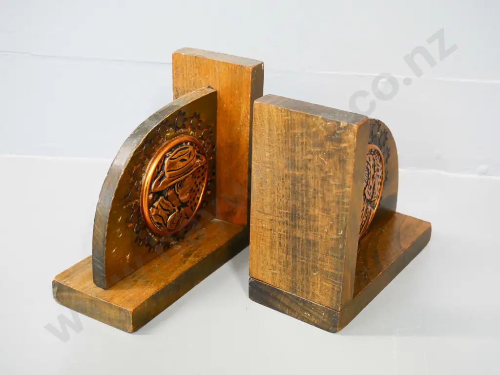 pair of wooden book-ends with chip or die stamp carving and copper plaques - man and woman H-140 W-150 Image 1++