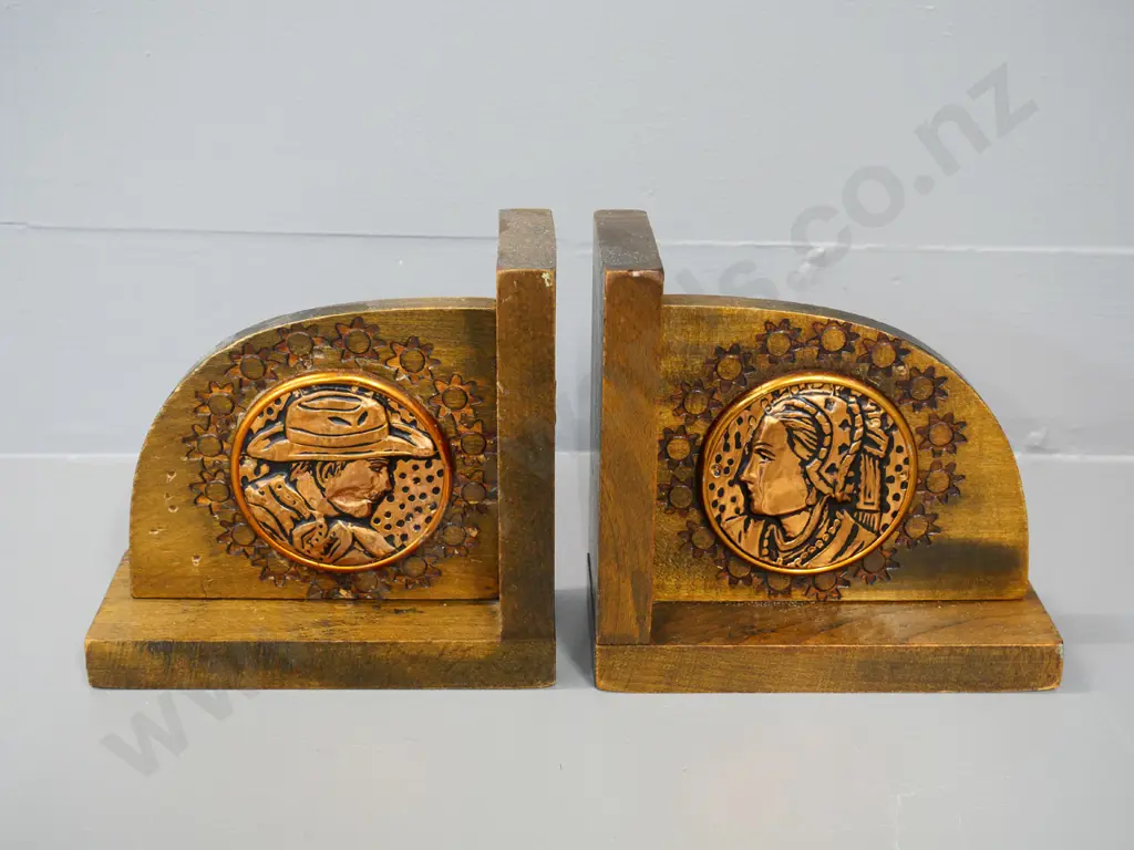 pair of wooden book-ends with chip or die stamp carving and copper plaques - man and woman H-140 W-150 Image 1++