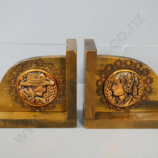 pair of wooden book-ends with chip or die stamp carving and copper plaques - man and woman H-140 W-150
