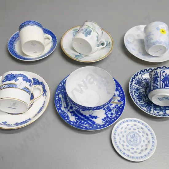 5 coffee cups and saucers, tea cup and saucer and small plate