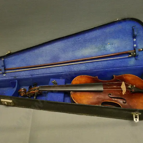 vintage violin in restorer's condition - tuning pegs and bridge need attention. With case and bow