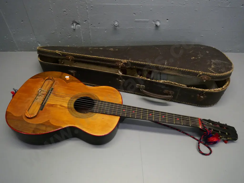 vintage acoustic guitar with painted back, various replacement strings, case Image 1++