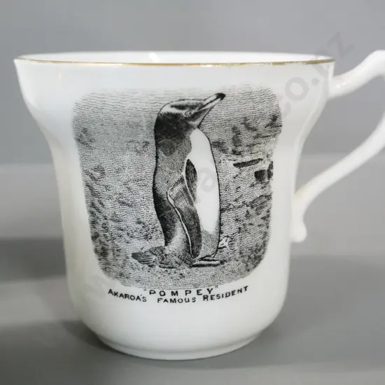 English made New Zealand souvenir ware - Pompey the Akaroa penguin, 5 Dunedin Exhibition eggcups, Dunedin vase