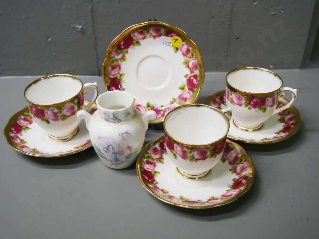 3 Roslyn rose and gilt coffee cups & saucers, an extra saucer, and a small Aynsley vase Image 1++