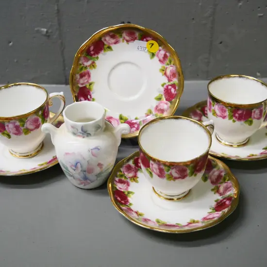 3 Roslyn rose and gilt coffee cups & saucers, an extra saucer, and a small Aynsley vase