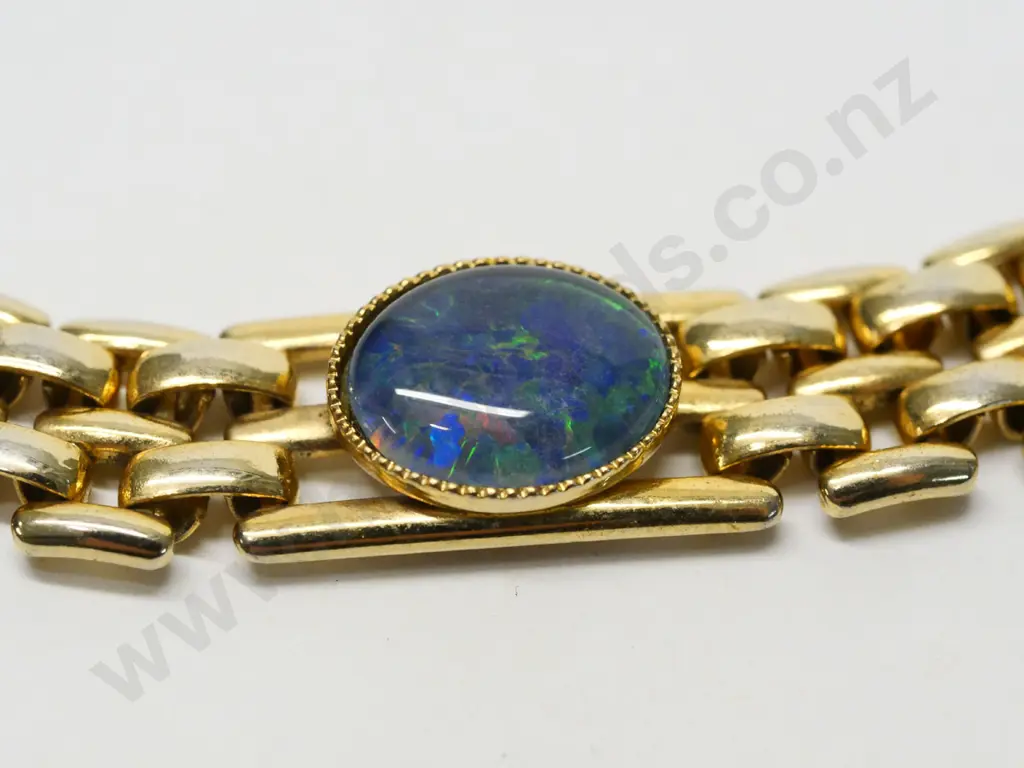 gold plated bracelet with 2 coloured stones Image 1++
