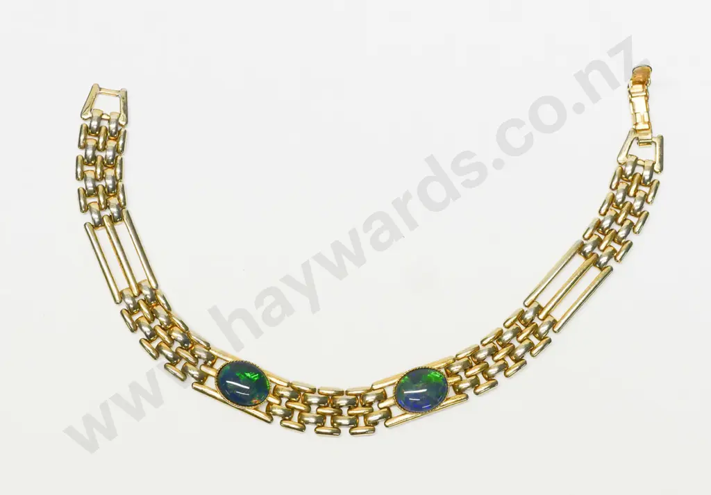 gold plated bracelet with 2 coloured stones Image 1++
