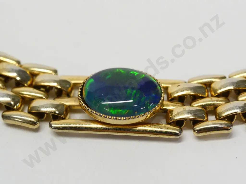 gold plated bracelet with 2 coloured stones Image 1++